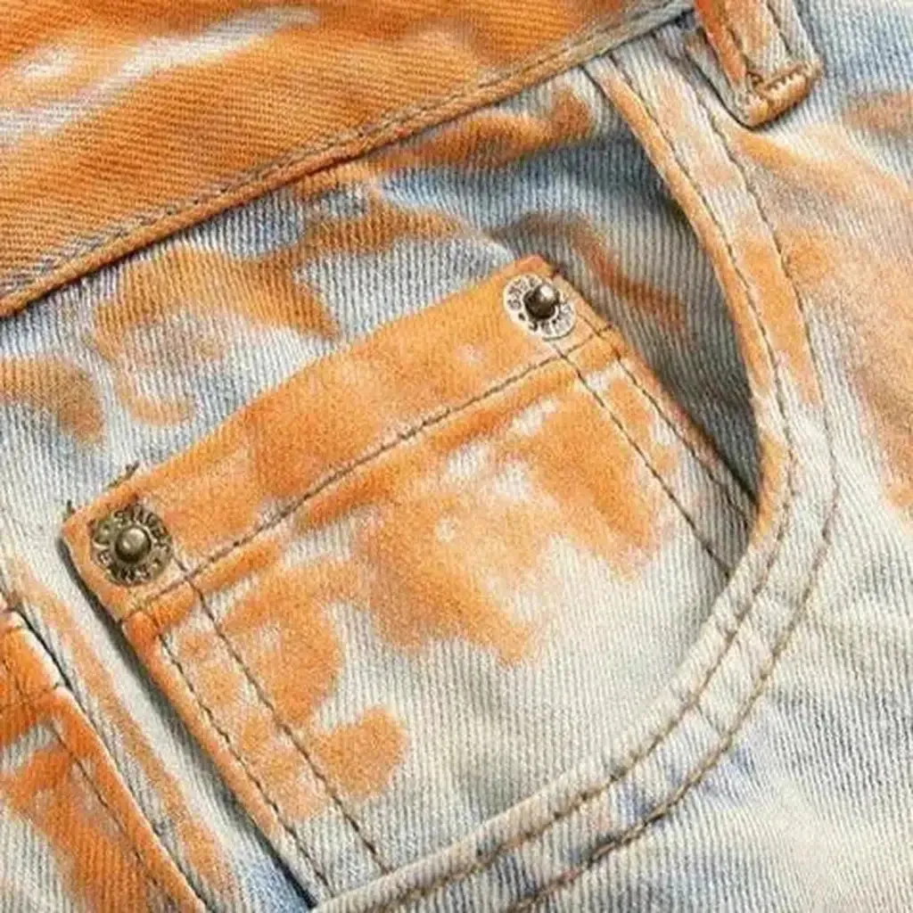 Light-wash men's painted jeans